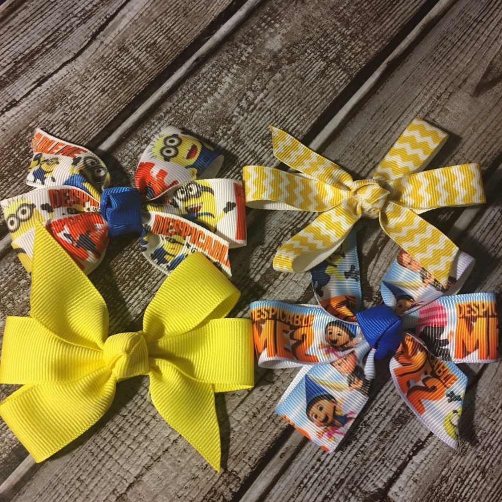 Buy 2 sets/ 3rd set FREE... 4pc despicable me bows